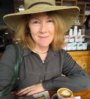 smiling woman in a hat
