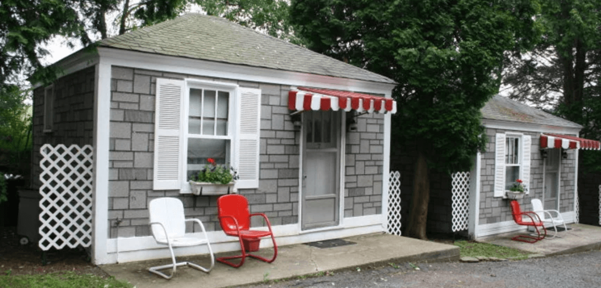Row of small vintage motor court cabins