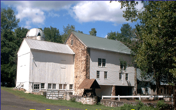Color photo shows rehabilitated barn