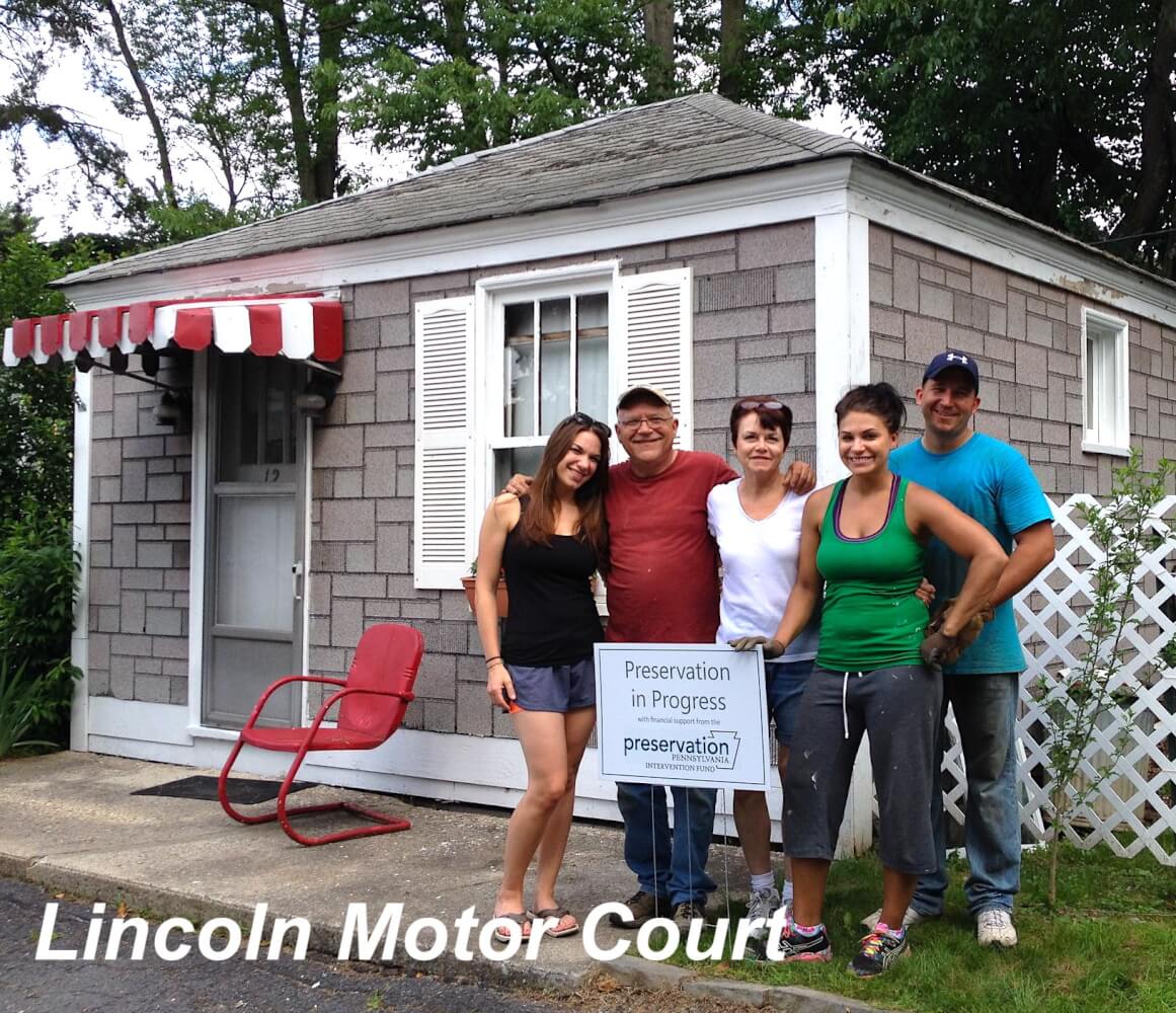 Altizer family posed outside a Lincoln Motor Court cabin