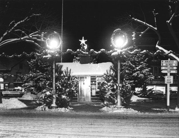 Santa's Cabin on the square at night