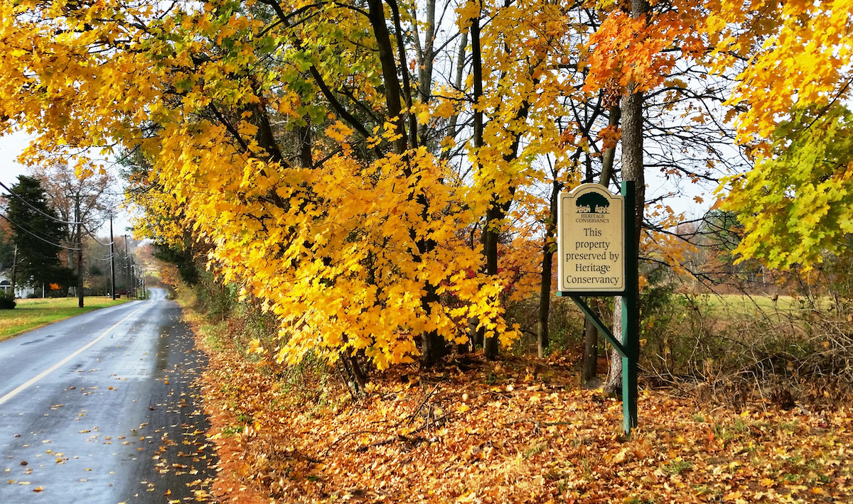 a sign that reads "This property preserved by Heritage Conservancy"