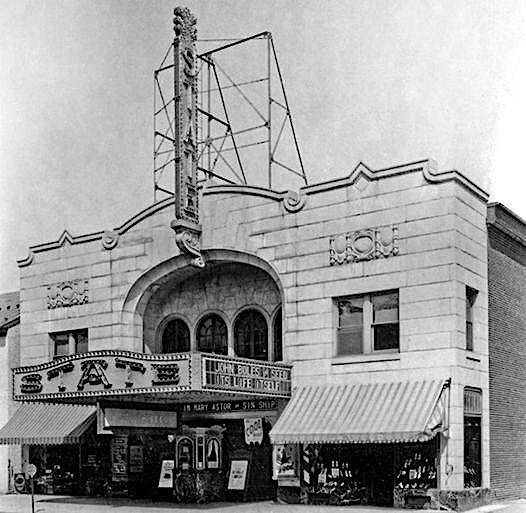 black and white image of the State Theater with the vertical signage extending above the roofline