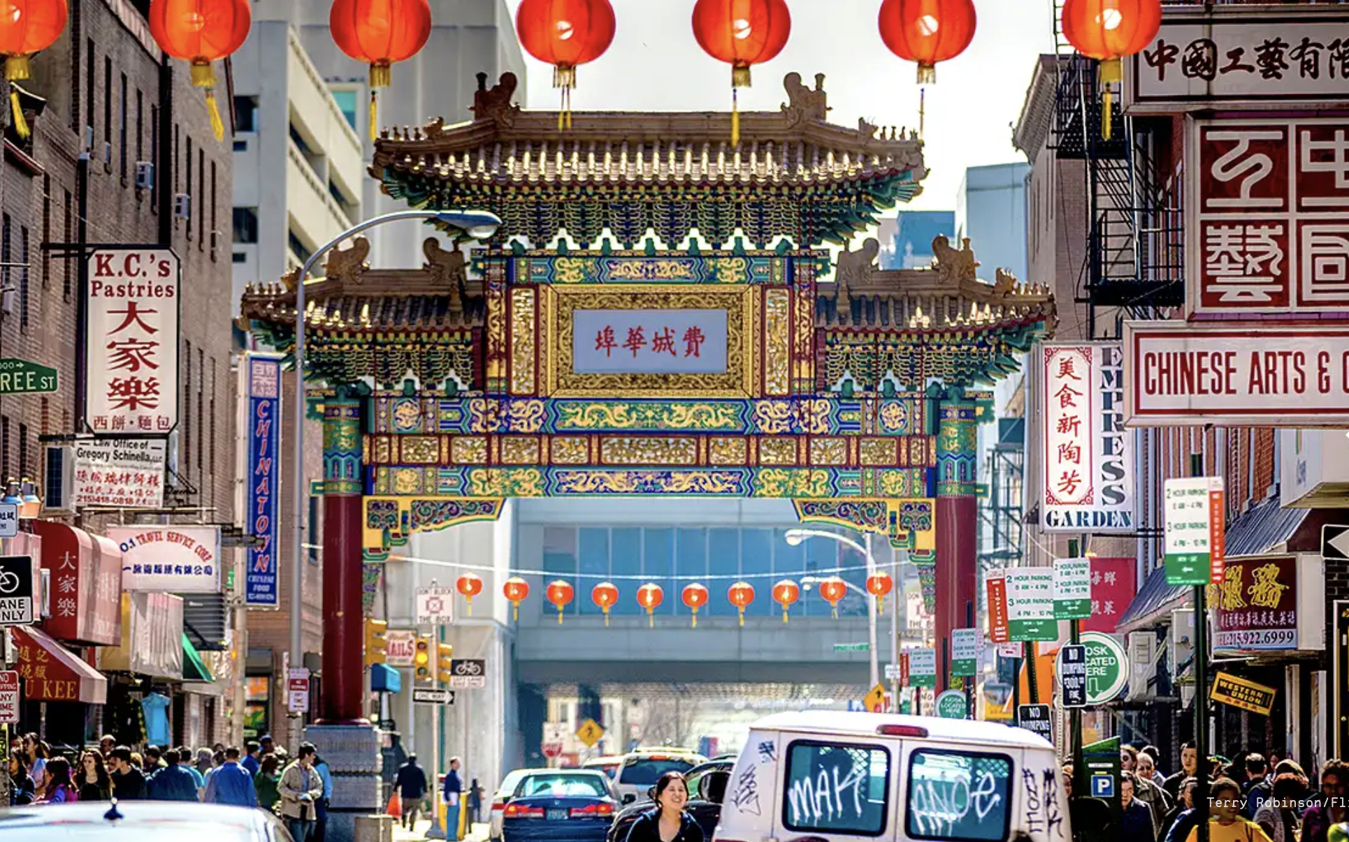 Red lanterns strung across the street frame the colorful Friendship Gate that is the portal to Philadelphia's Chinatown neighborhood.