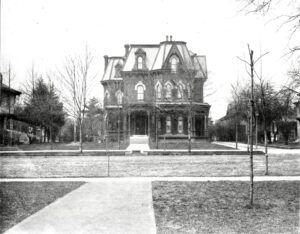Black and white photo of the Herbst House taken from across the street, mid-1890s