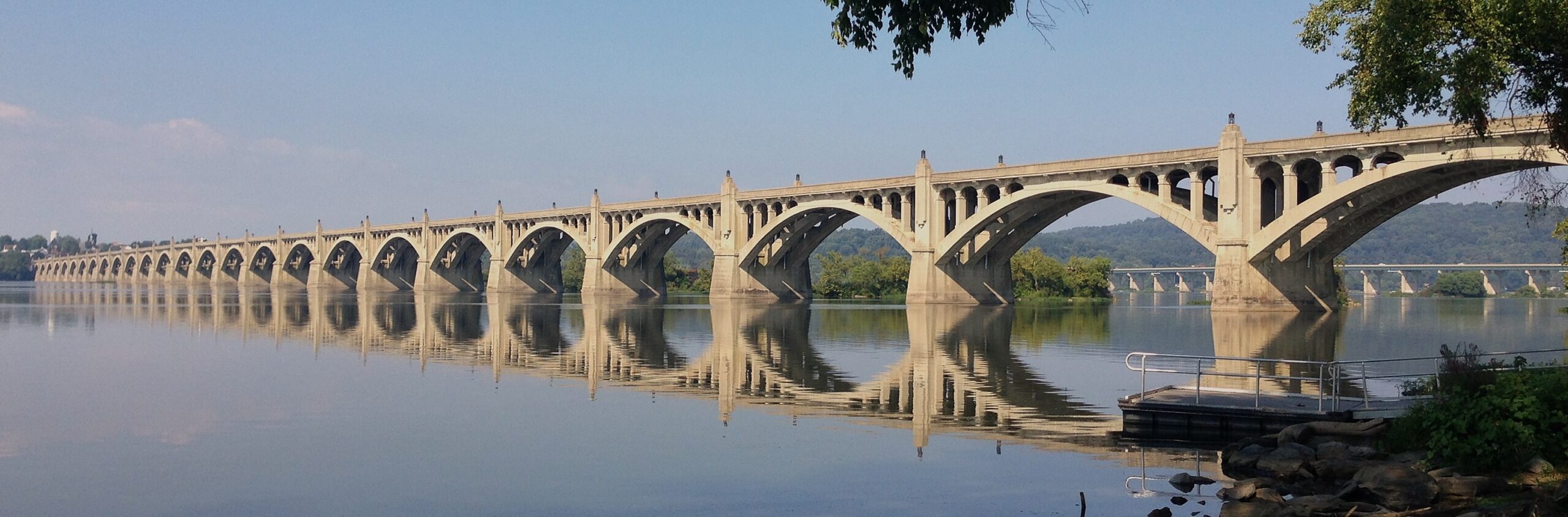 Bridge arches reflected in the Susquehanna River below
