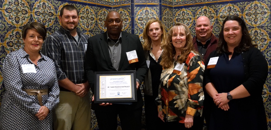 Mt. Tabor Preservation Project team accepting their Rehabilitation Award, with Board Chair Jane Sheffield