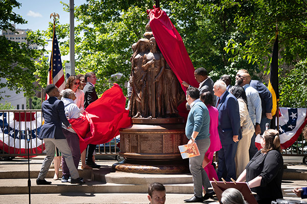 James A. Hill and others at the unveiling of a statue, 2024 Leadership Award ceremony