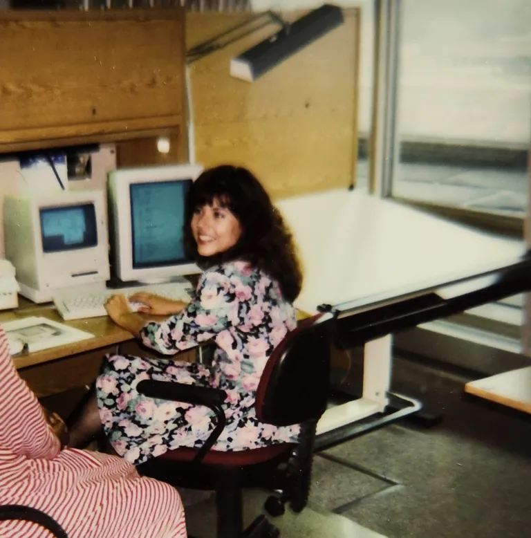 Gina working at her desk at the State Museum