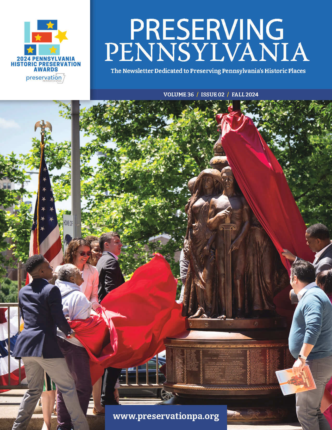 2024 awards cover featuring monument unveiling ceremony